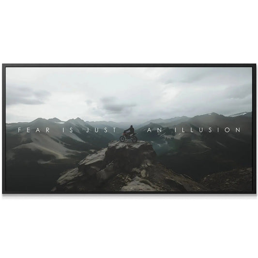Moody, overcast landscape background behind the motivational text for 'Action Sports - Fear Is Just An Illusion.'