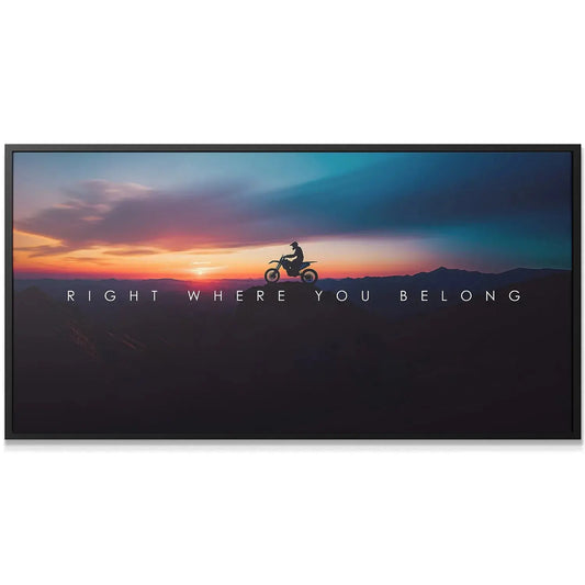 Close-up of the dirt bike and rider against the fiery orange sunset, Action Sports - Right Where You Belong.