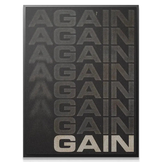 Close-up textural detail showing the fading gradient effect of the 'Again GAIN' typography on matte paper.