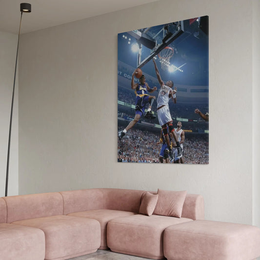 Canvas wall art of Kobe Bryant attacking the basket against the Philadelphia 76ers.