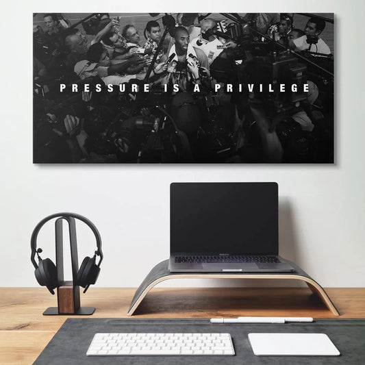Lifestyle shot of the framed Kobe Bryant - Pressure Is A Privilege wall art hanging in a motivational office setting.