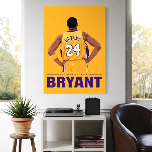 wall art of a basketball player in a yellow jersey with 'Bryant' on a yellow background, displayed in a room with a window and plant.