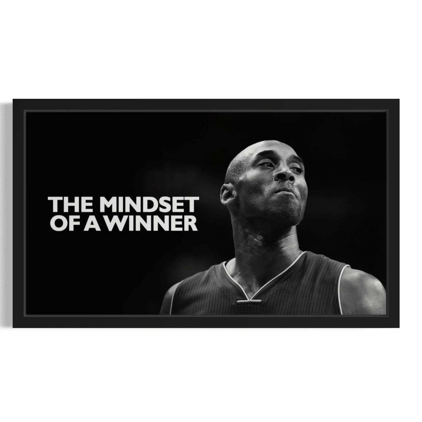 Black and white image of a basketball player with 'The Mindset of a Winner' text.