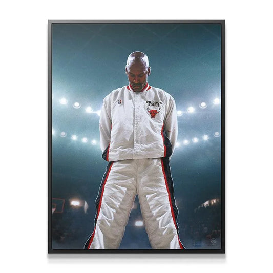 Close-up portrait of Michael Jordan - Encore, head bowed in reflection under stadium lights.