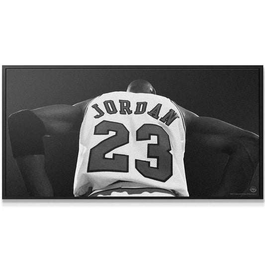 Close-up, low-angle shot of Jordan's shoulders and jersey in the Michael Jordan - Larger Than Life artwork.