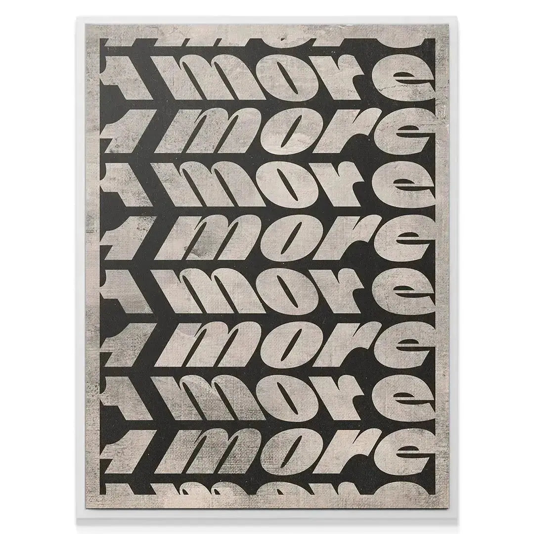 Angled shot of the typography showing the dynamic italicized, bold lettering of '1 More' on the stark black canvas.