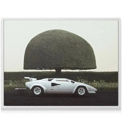 Close-up view of the Countach's iconic rear wheel and fender capturing the moody atmosphere of '6 am In Hamptons'.