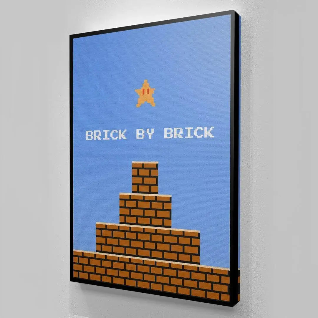 Corner perspective highlighting the sleek black frame surrounding the classic '8bit Brick By Brick' poster design.