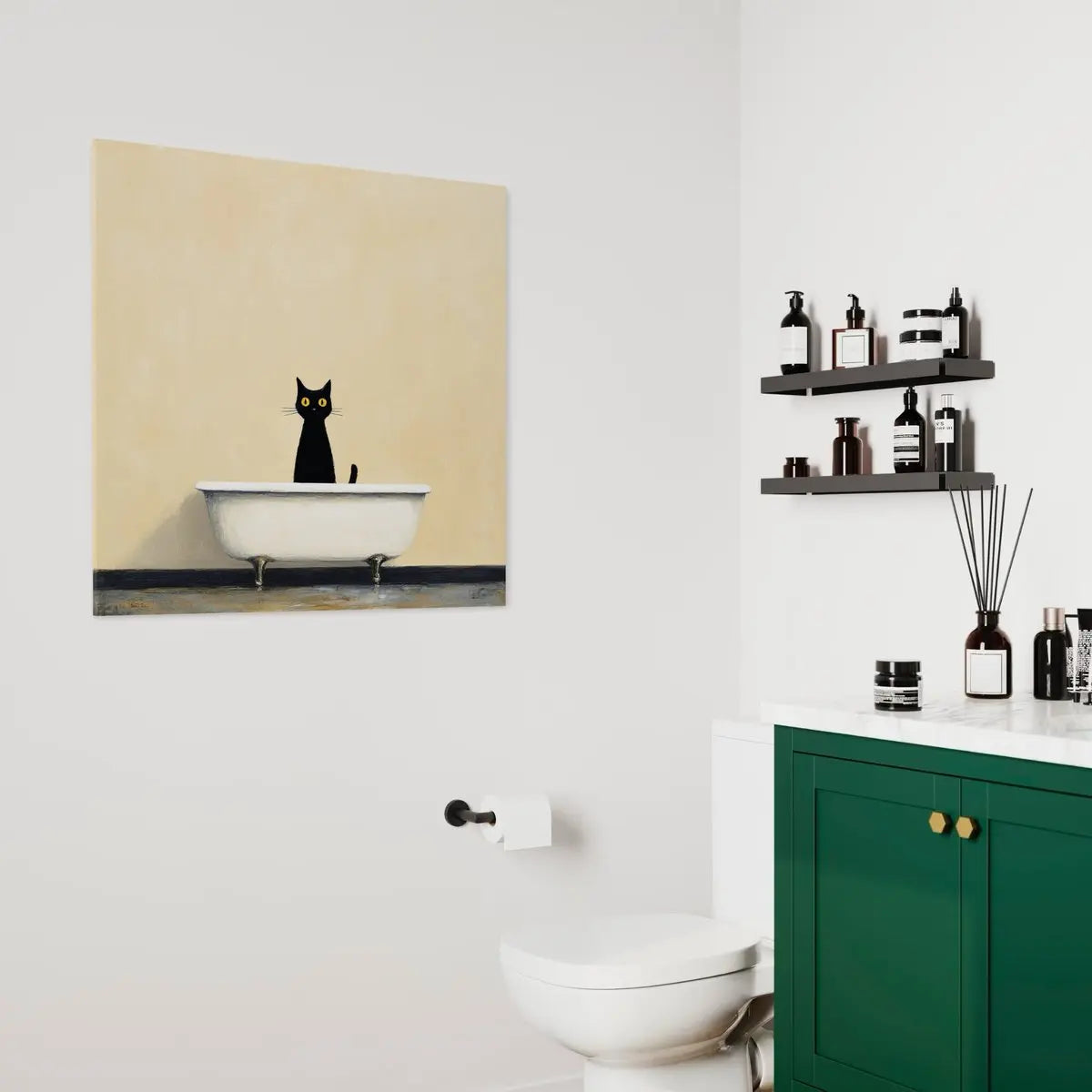 Modern bathroom interior with canvas wall art showing a black cat in a white bathtub hanging beside a glass shower door.
