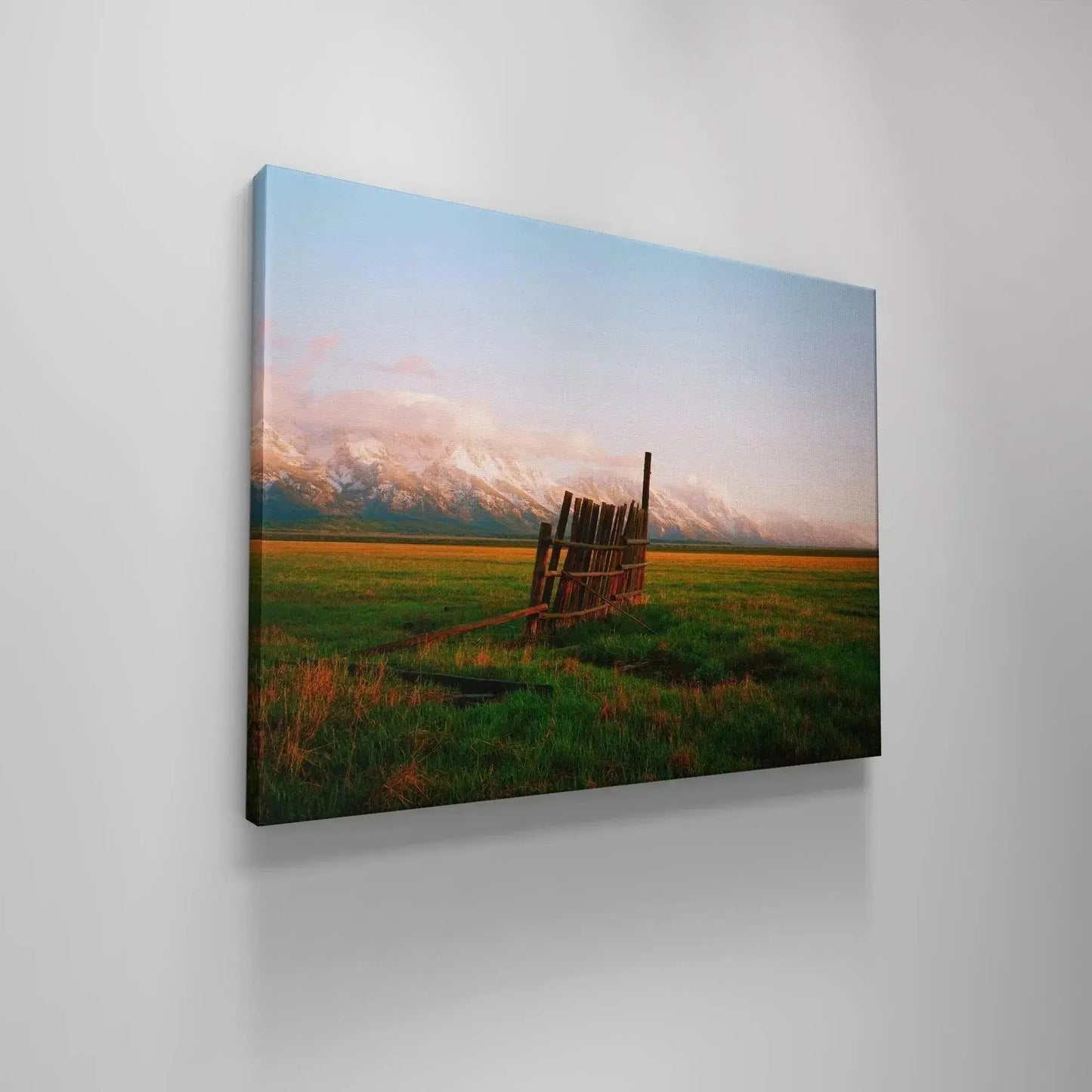 Elevated perspective showing the slight lean and height of A Fence in Jackson contrasted with the horizon.