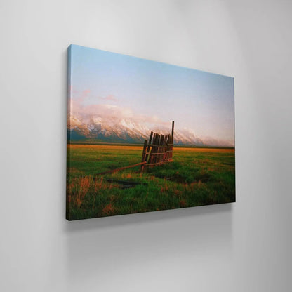 Elevated perspective showing the slight lean and height of A Fence in Jackson contrasted with the horizon.