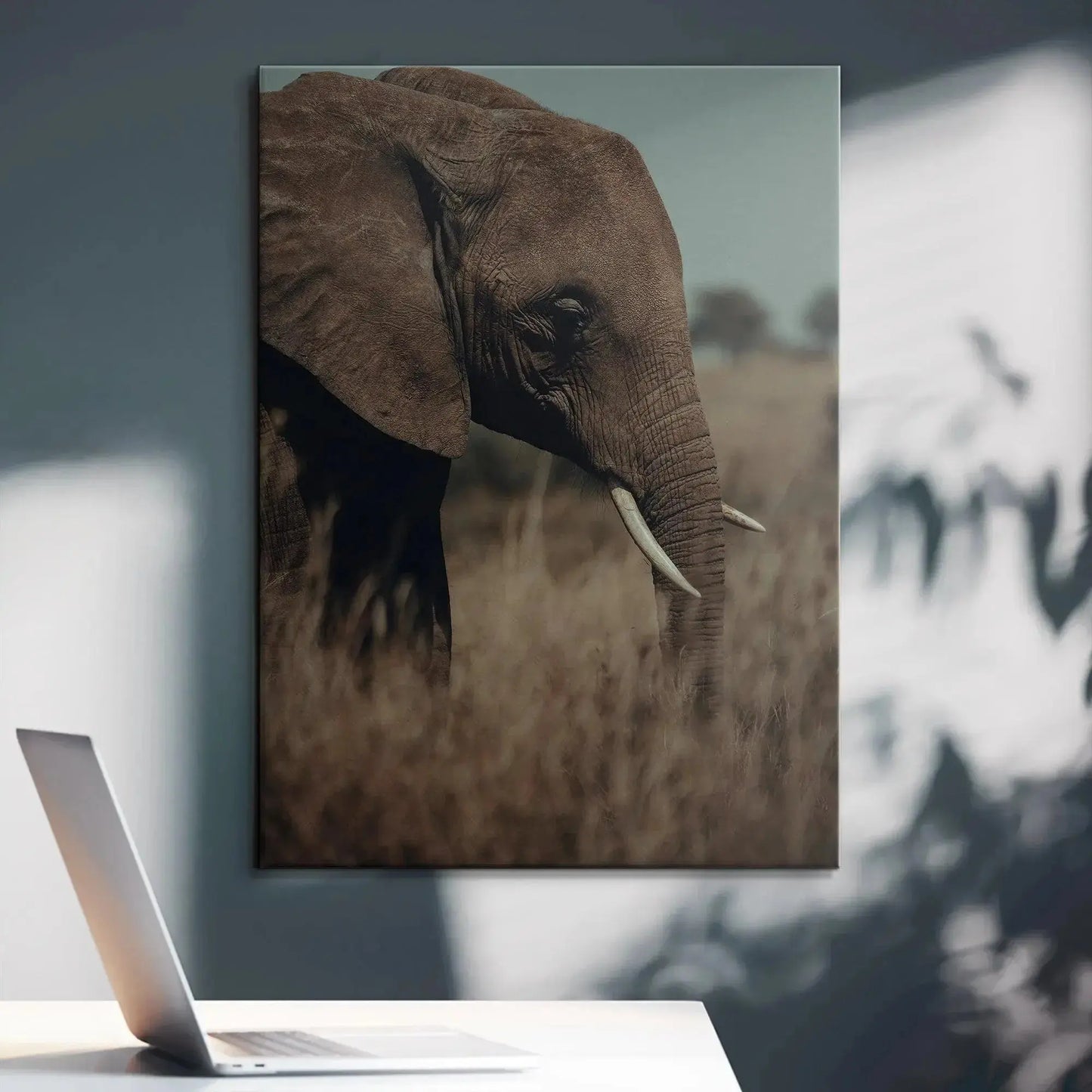 Wrinkled elephant ear detail and focused eye expressing the quiet strength of 'A Tall Moment' photography.
