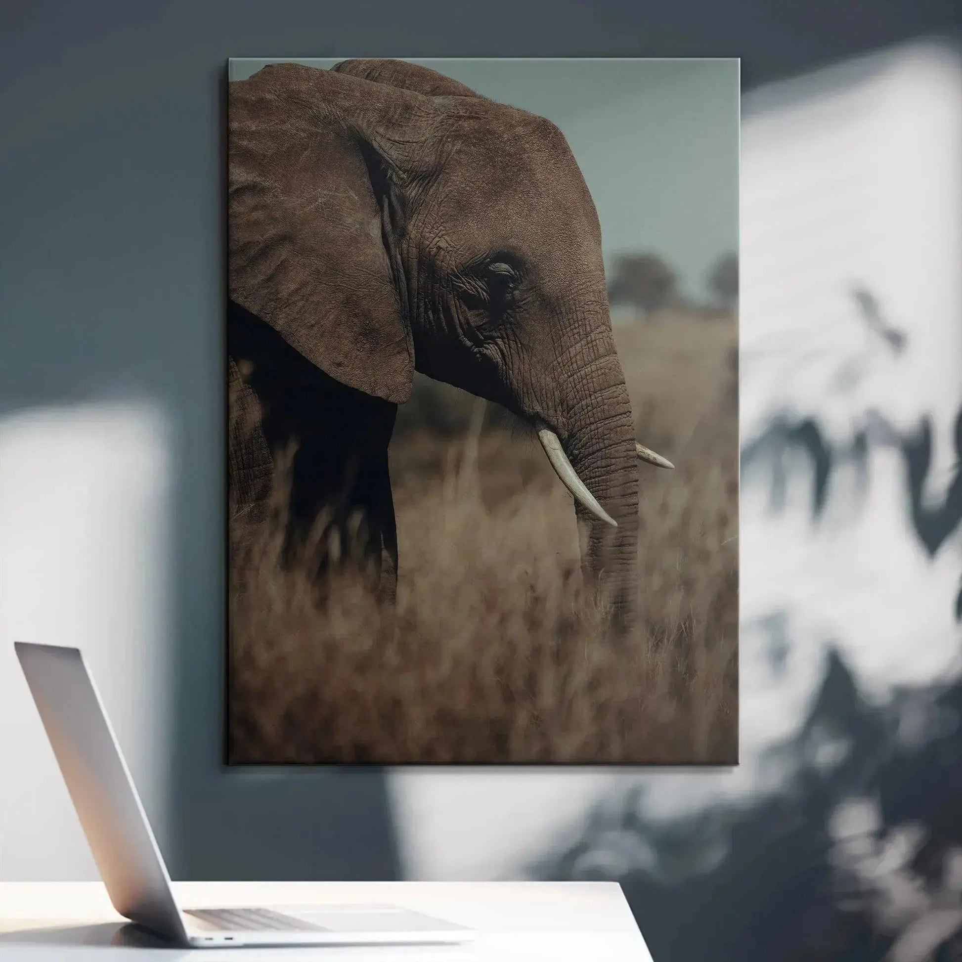 Wrinkled elephant ear detail and focused eye expressing the quiet strength of 'A Tall Moment' photography.