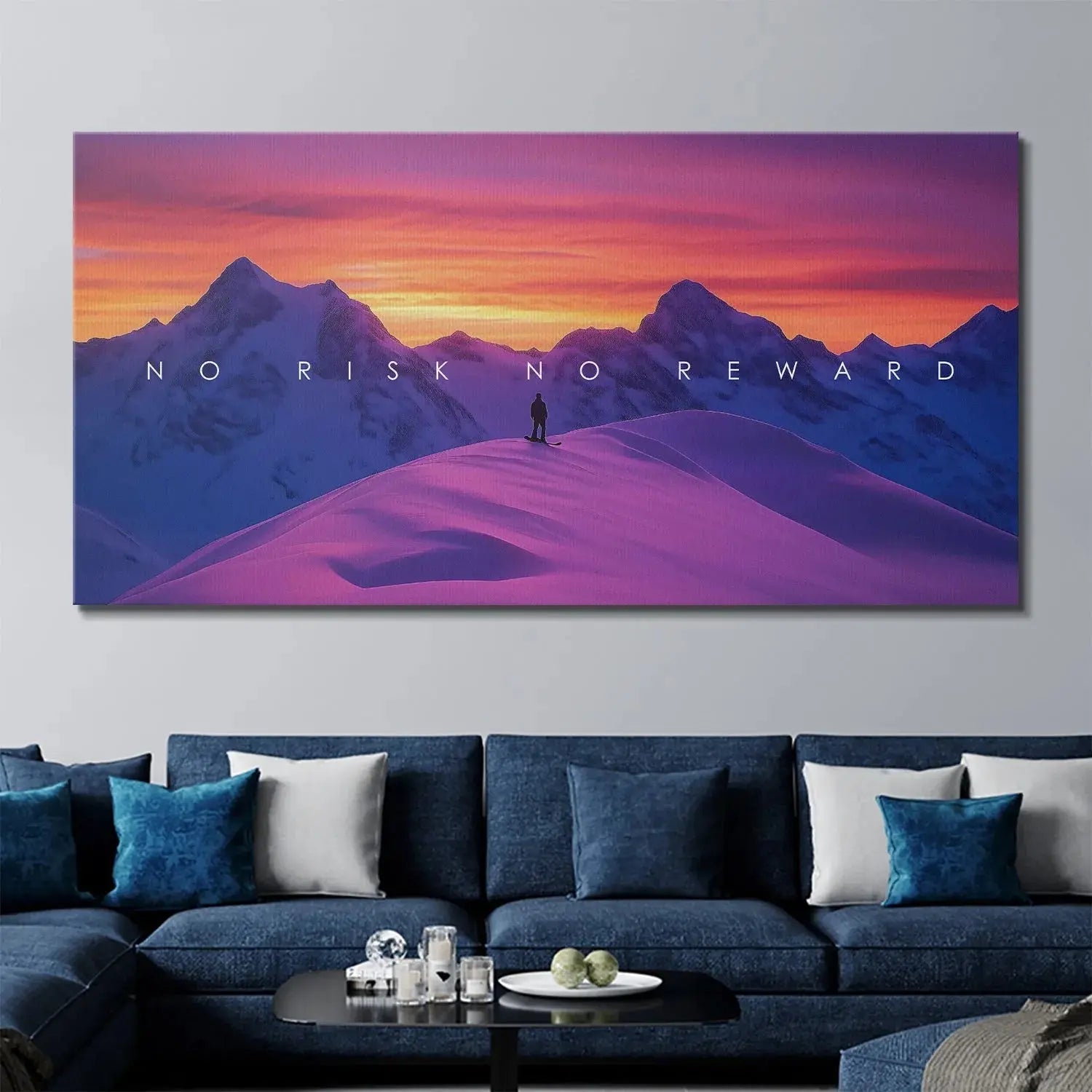 Silhouette of the lone snowboarder standing high above the valley in the panoramic 'Action Sports - No Risk No Reward' art.