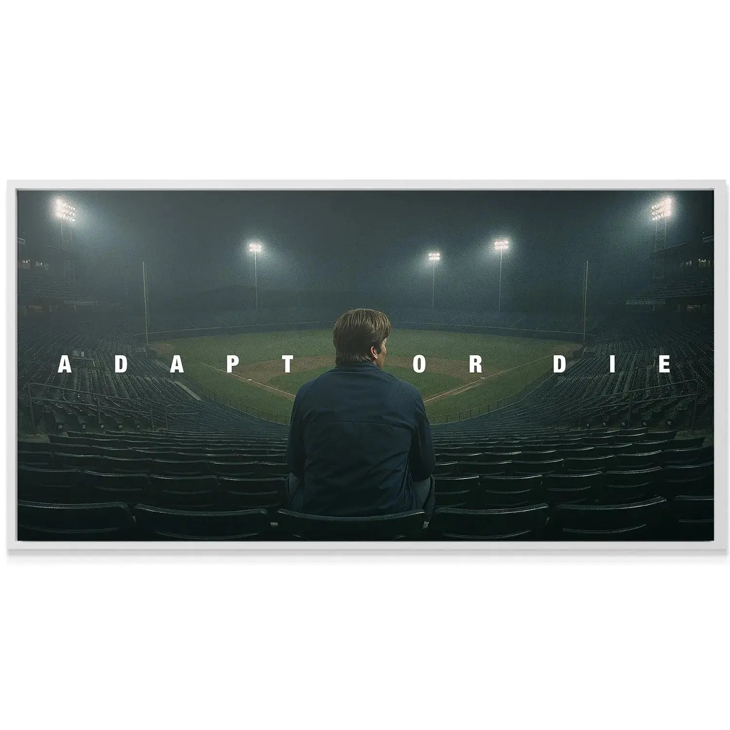 Low-angle perspective of the empty baseball stands emphasizing the scale of the 'Adapt Or Die' challenge.
