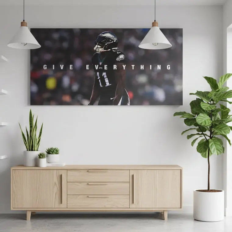 Angular view of the AJ Brown - Give Everything poster emphasizing the player's intense profile and shadowed face.