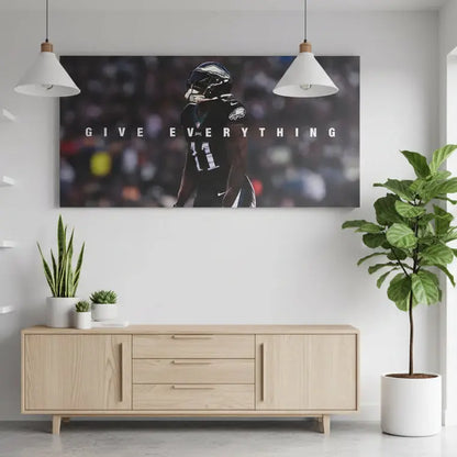 Angular view of the AJ Brown - Give Everything poster emphasizing the player's intense profile and shadowed face.