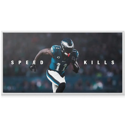 Lifestyle mockup showing the large canvas featuring AJ Brown - Speed Kills displayed prominently in a modern living room.