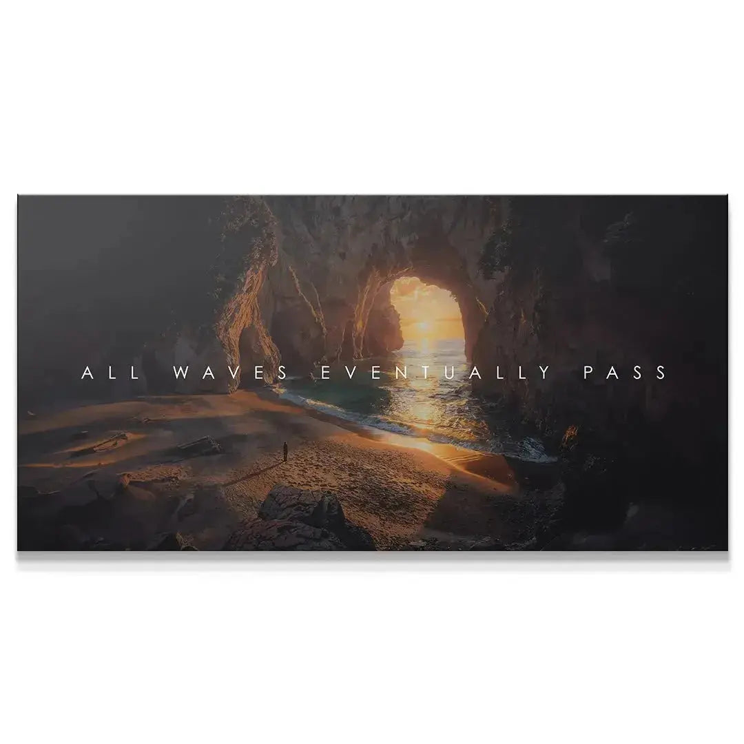Panoramic view of the sea cave archway at sunset, emphasizing the text 'All Waves Eventually Pass'.