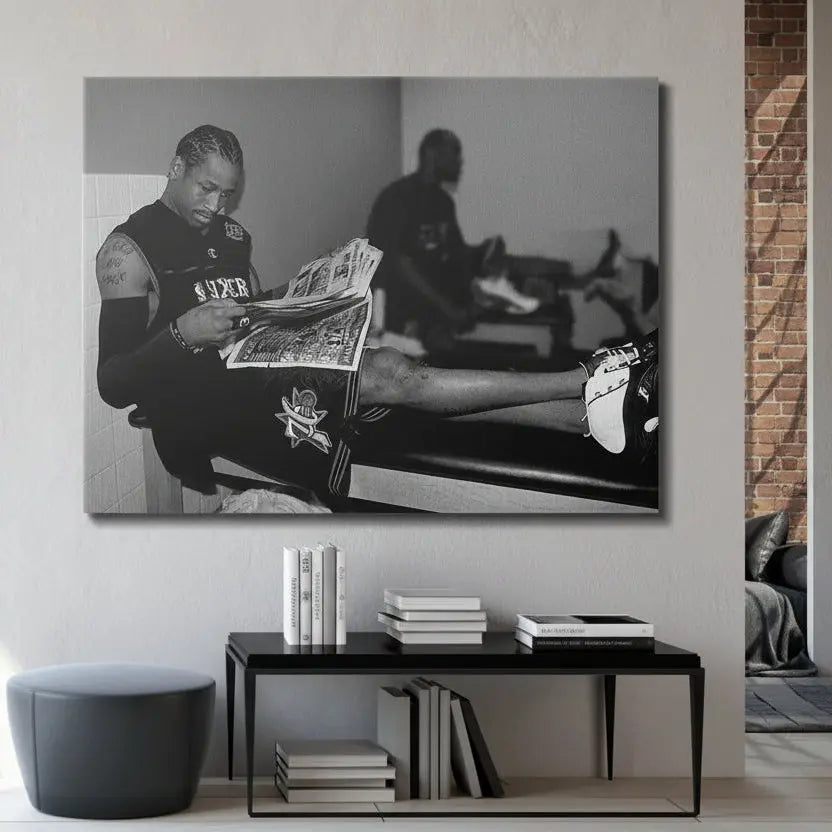 Lifestyle setting (locker room): Authentic locker room scene with Allen Iverson seated, reflecting on the news in the 'Allen Iverson - Headlines' print.