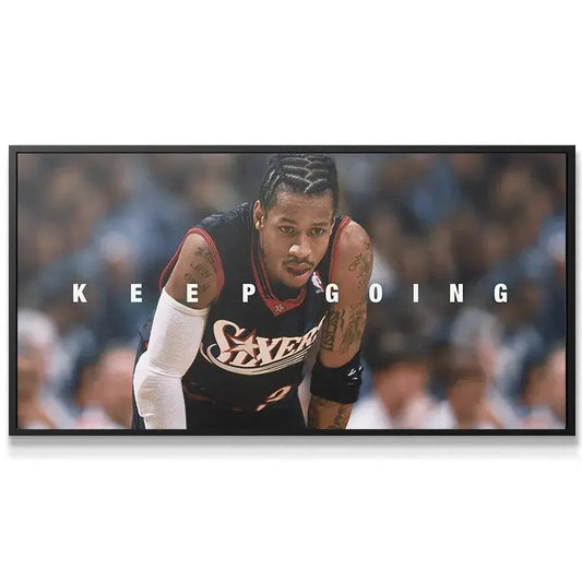 Wide shot of the motivational canvas print featuring 'Allen Iverson - Keep Going' in a home office setting.