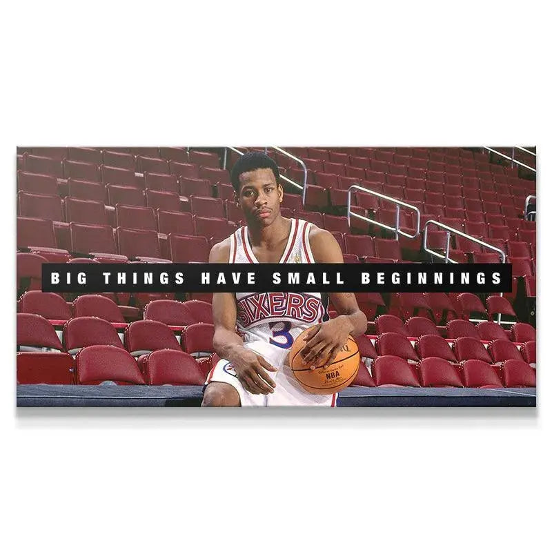 Full shot of Allen Iverson - Small Beginnings poster showing AI sitting on the red arena seats holding a basketball.
