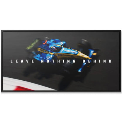 Wide-angle shot of the F1 car blurring past the curbing, emphasizing 'Alonso - Leave Nothing Behind'.