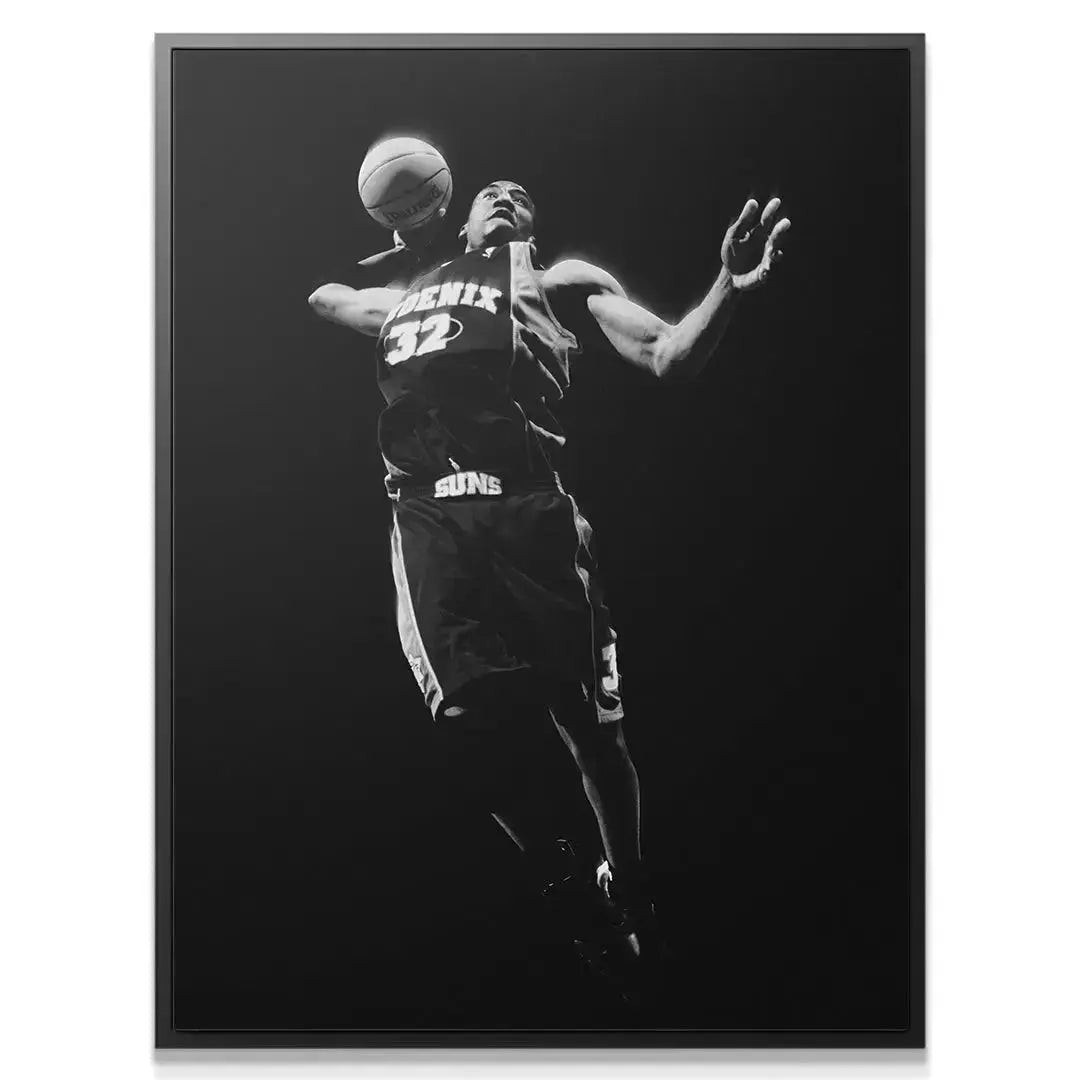 Close-up on the intensity of Amar'e Stoudemire - #2's face during his powerful jump shot.