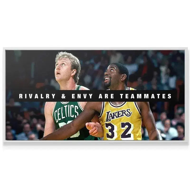 Lifestyle setting featuring the framed Bird & Magic - Rivalry and Envy wall art displayed above a modern desk or memorabilia shelf.