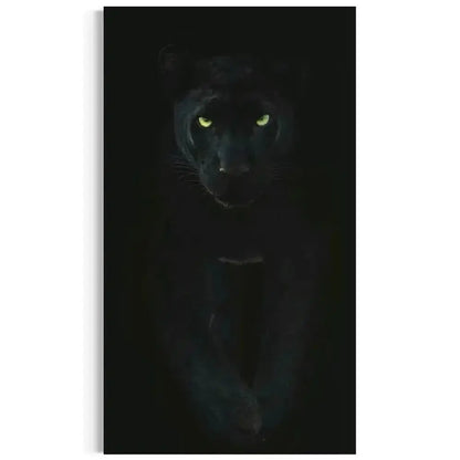 Vertical close-up of the panther's face showcasing bright green eyes in the Black panther wall art.