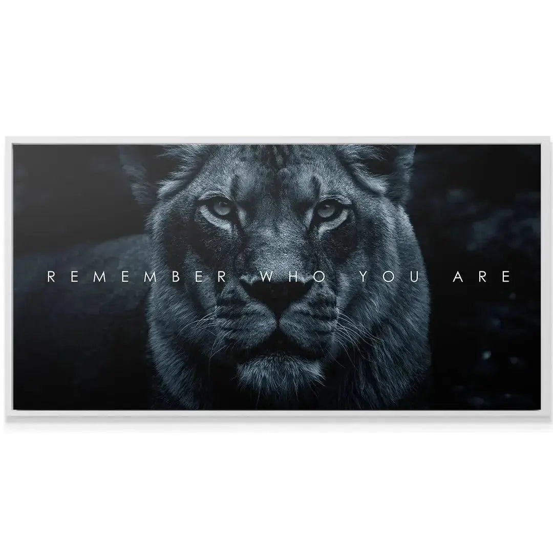 Monochromatic wall art displaying the centered motivational quote, Chris Henry - Remember Who You Are.