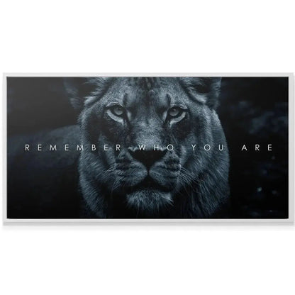 Monochromatic wall art displaying the centered motivational quote, Chris Henry - Remember Who You Are.