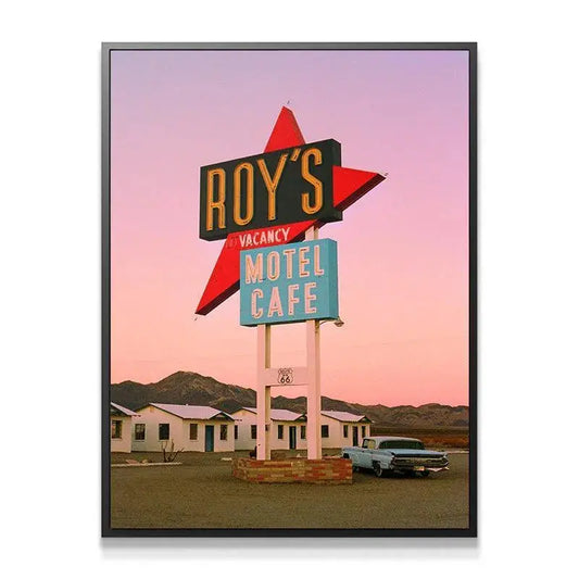Close-up detail of the vintage blue car parked in front of the motel units in the 'Desert Dreams' photograph.