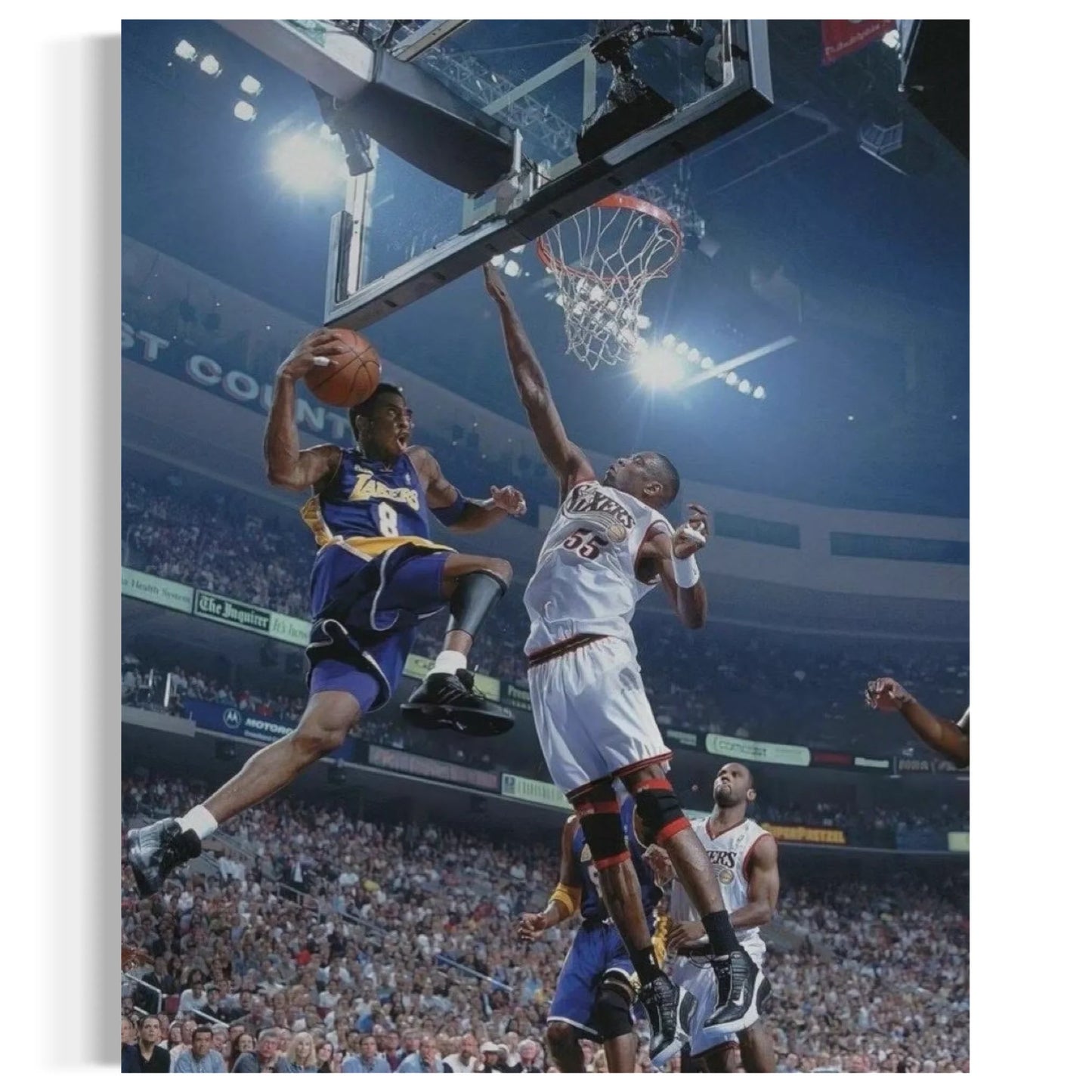 Canvas print of Kobe Bryant making an iconic move against the Philadelphia 76ers, a perfect wall decor for basketball fans.