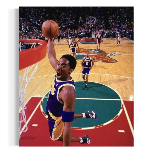 Canvas wall art of Kobe Bryant dunking with intensity during a Lakers game.