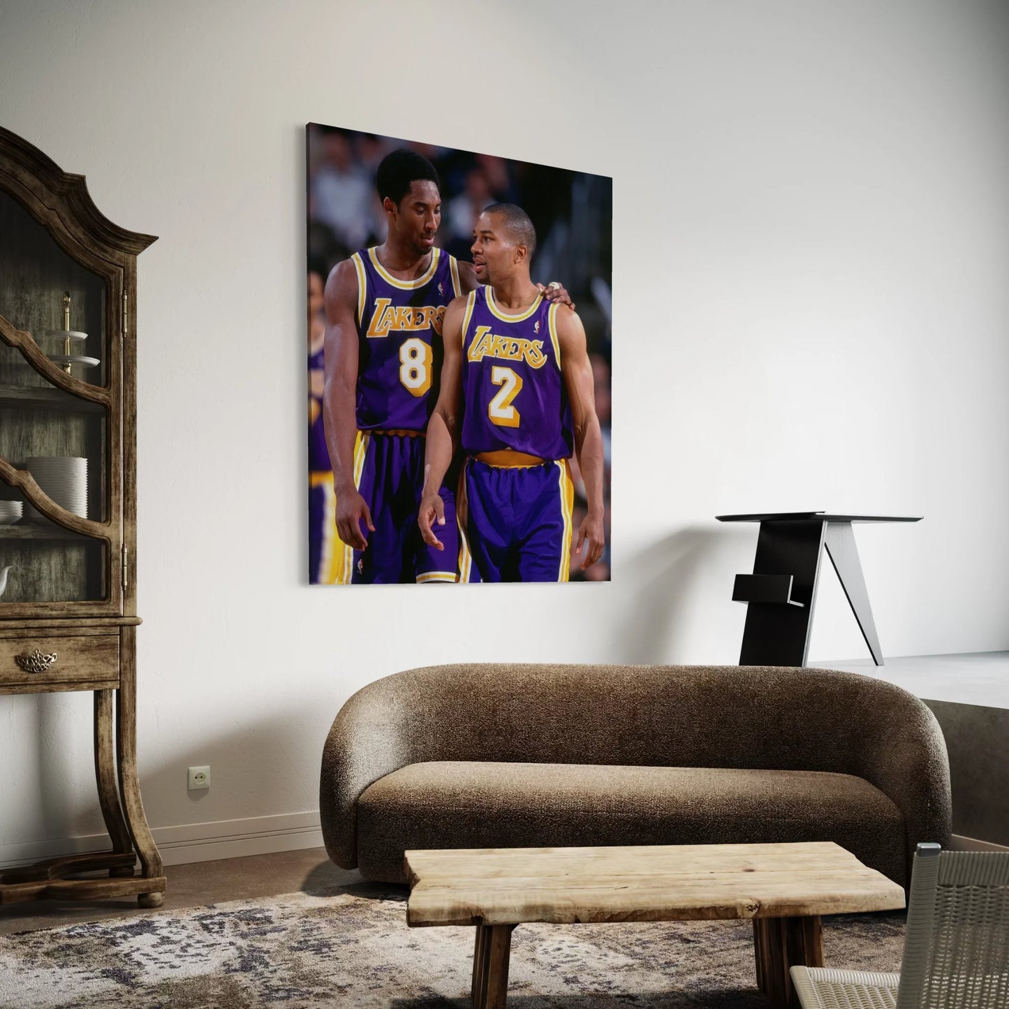 Framed wall art of Kobe Bryant and Derek Fisher from the Lakers in purple jerseys.