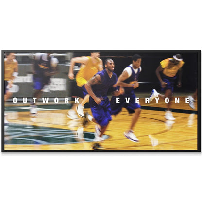 Wide angle view capturing the full team practice intensity on the basketball court: Kobe - Jog - Outwork Everyone.