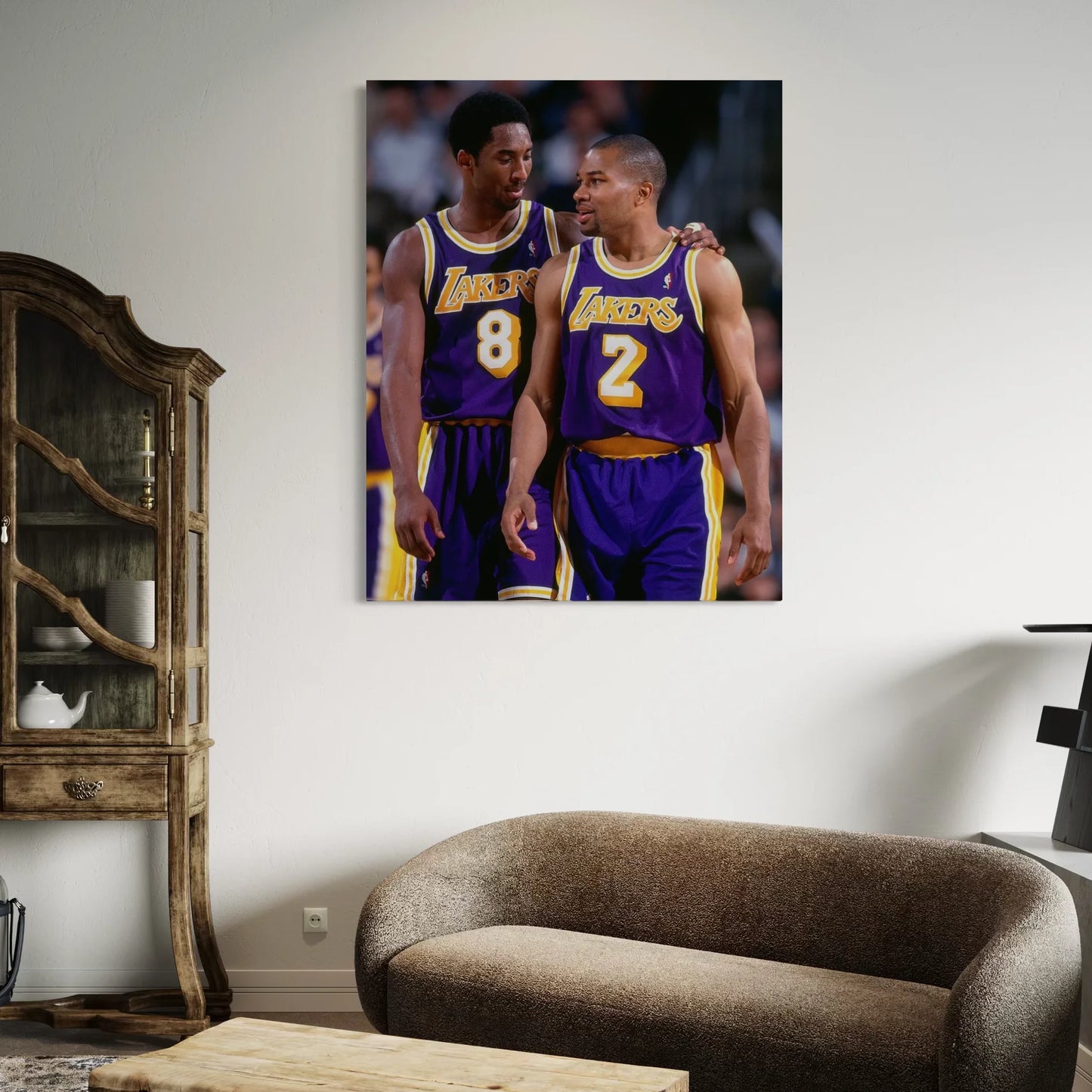 Los Angeles Lakers wall art with Kobe Bryant and Derek Fisher displayed in a cozy living room.