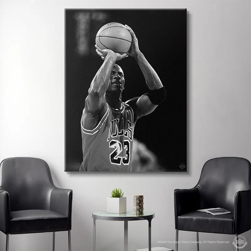 Lifestyle shot featuring the framed wall art Michael Jordan - Eyes Closed displayed in a sports memorabilia room.