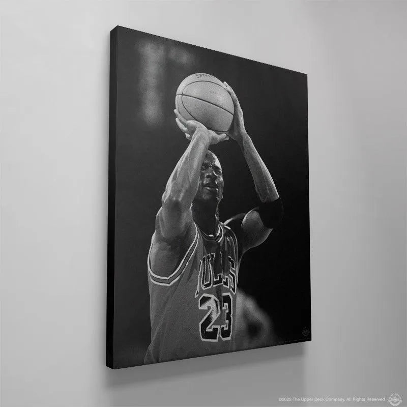 Low-angle perspective emphasizing the height and power of the jump shot in Michael Jordan - Eyes Closed.