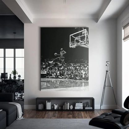 "Michael Jordan - Frozen In Time" capturing the dramatic perspective looking up at the soaring basketball legend near the rim.