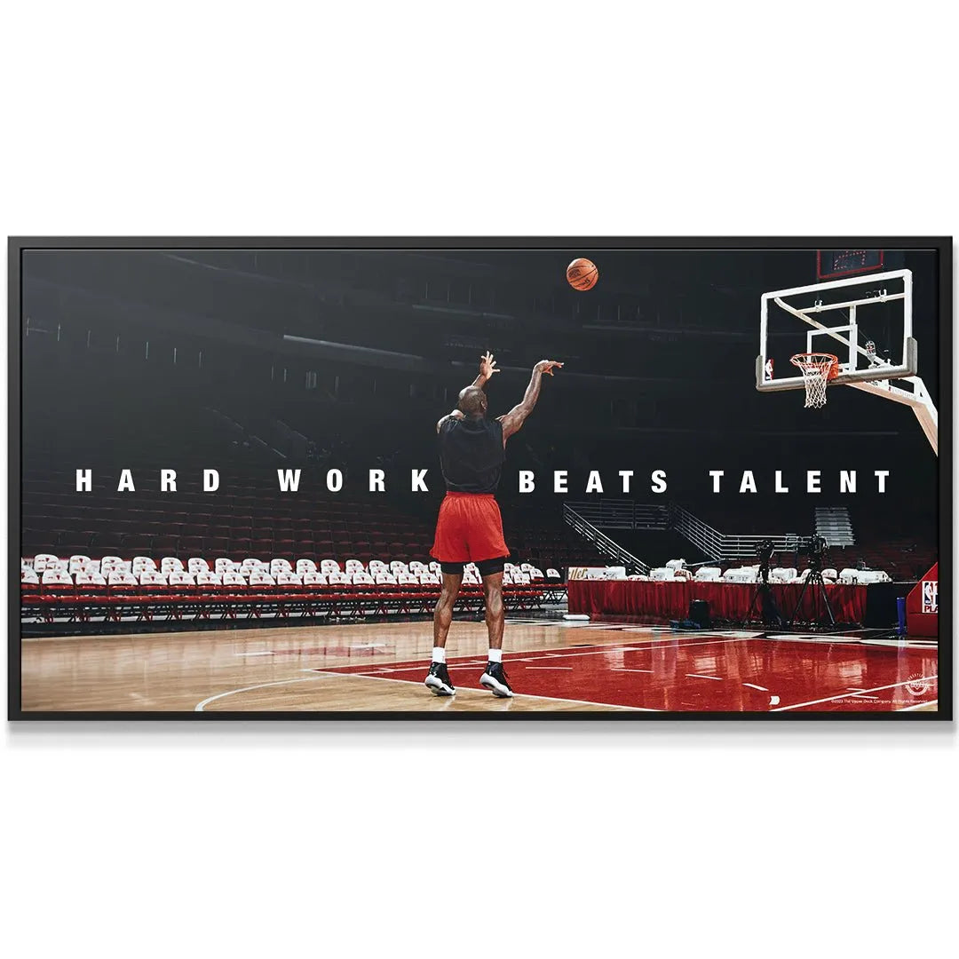 Close-up texture shot of the glossy basketball court surface featured in the Michael Jordan - Hard Work Beats Talent print.