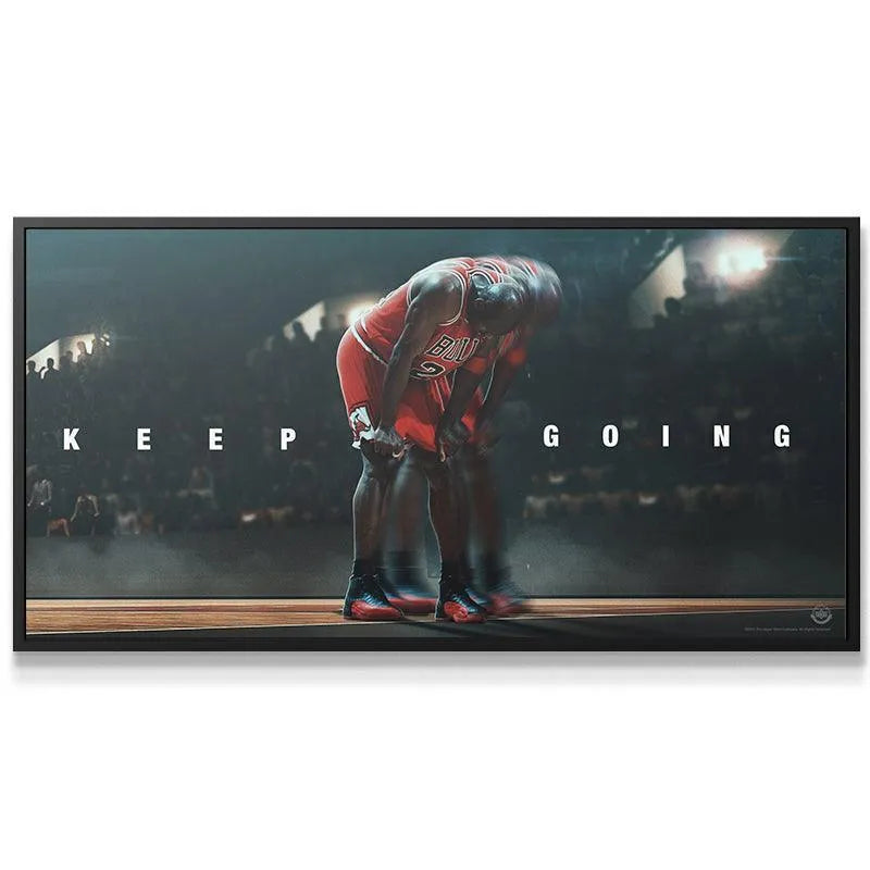 Dynamic close-up focusing on Michael Jordan's hands on his knees and the shoes in the 'Michael Jordan - Keep Going' design.
