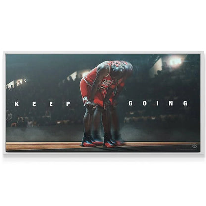 Wide-angle view of the dimly lit arena emphasizing the drama of the 'Michael Jordan - Keep Going' inspirational wall art.