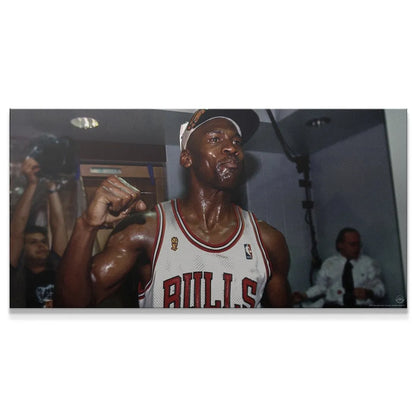 Lifestyle image of the poster 'Michael Jordan - Nothing Worth Having Comes Easy' displayed on a wall in a modern office or gym setting.