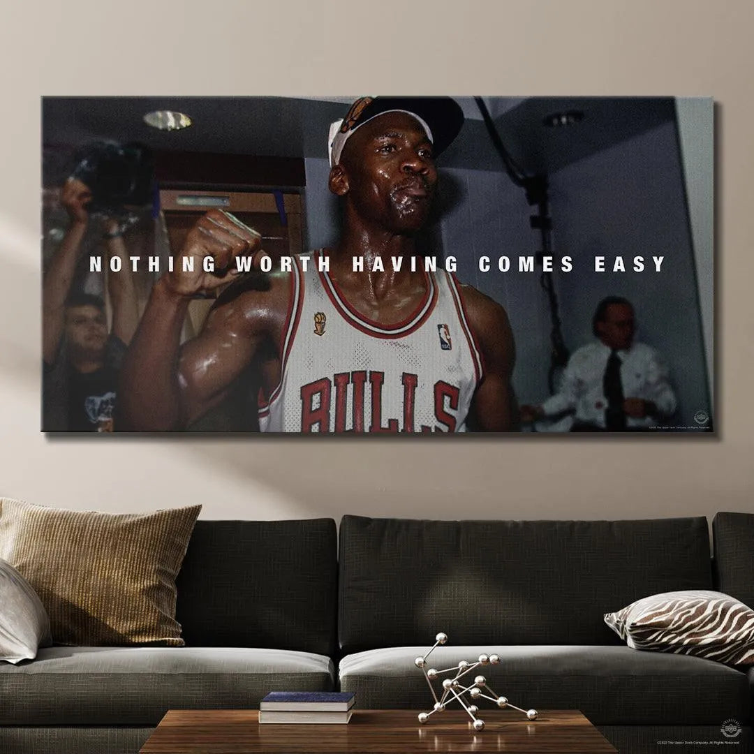 Bottom-left crop highlighting the official NBA licensing stamp guaranteeing authenticity of the 'Michael Jordan - Nothing Worth Having Comes Easy' poster.