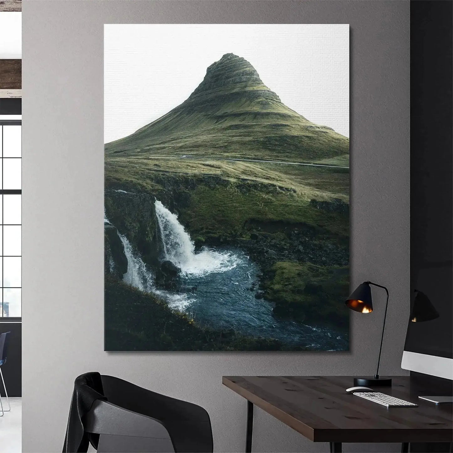 Low angle perspective capturing the mighty peak of Kirkjufell towering over the landscape of '(N)iceland'.