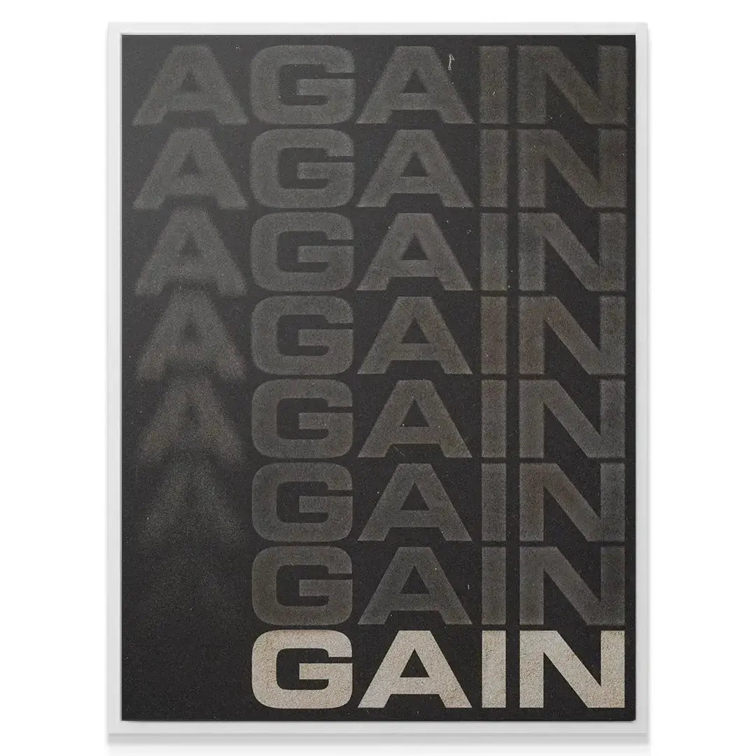 Low angle view highlighting the bold, bright text of the final 'GAIN' within the 'Again GAIN' composition.