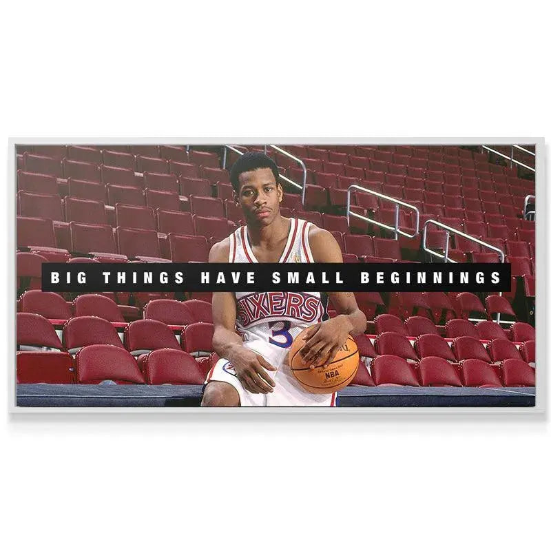 Lifestyle shot of the framed Allen Iverson - Small Beginnings artwork displayed above a modern office desk.