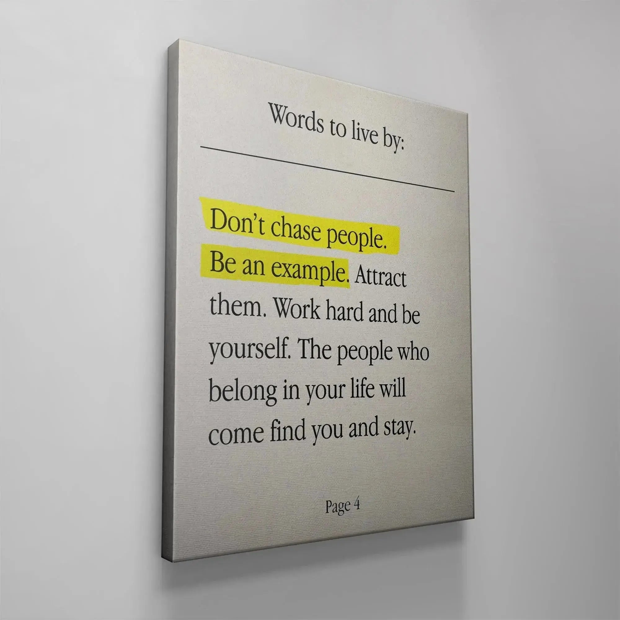 Vertical perspective of the self-improvement poster titled 'Attract' on a white wall.